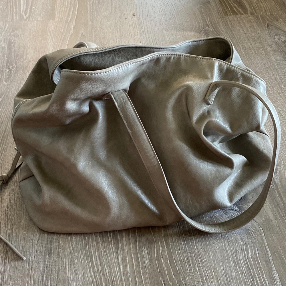 Large purse with three sections and matching zipper bag inside